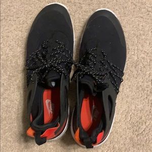 Nike open back black running or casual wear.